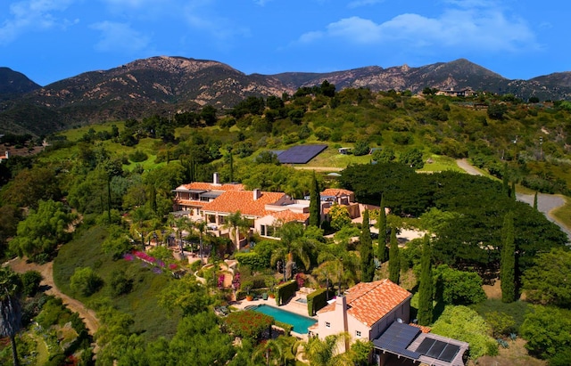 bird's eye view with a mountain view