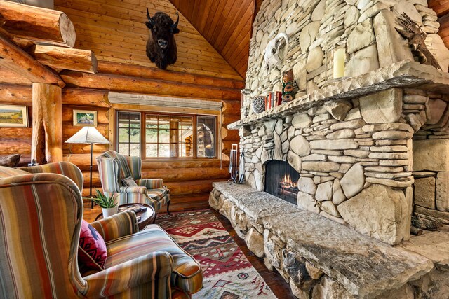 unfurnished living room with wooden ceiling, a fireplace, high vaulted ceiling, rustic walls, and hardwood / wood-style floors