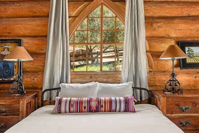 bedroom with log walls