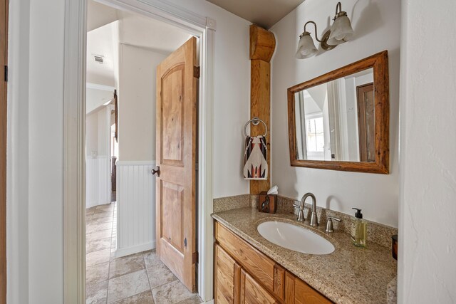 bathroom with vanity and tile patterned flooring