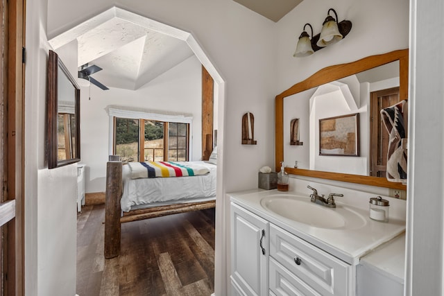 bathroom featuring vanity and hardwood / wood-style flooring