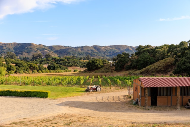 view of mountain feature with a rural view