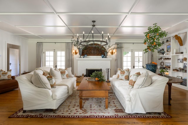 1259 Alamo Pintado Rd, Solvang, CA 93463 - living area with plenty of natural light, wood finished floors, a chandelier, and a brick fireplace