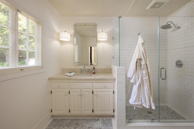 1259 Alamo Pintado Rd, Solvang, CA 93463 - full bath featuring a shower stall, vanity, crown molding, baseboards, and tile patterned floors
