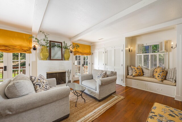 1259 Alamo Pintado Rd, Solvang, CA 93463 - living room featuring beamed ceiling, dark wood finished floors, and a brick fireplace