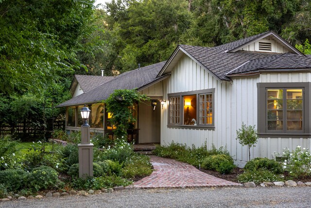 1259 Alamo Pintado Rd, Solvang, CA 93463 - view of front of house with roof with shingles and board and batten siding