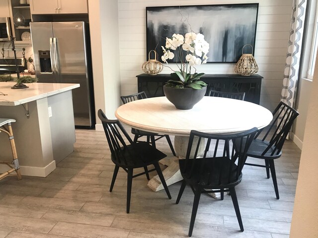 dining room with light hardwood / wood-style floors