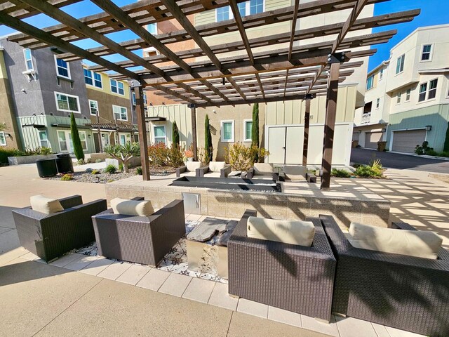 view of patio featuring a pergola and an outdoor hangout area