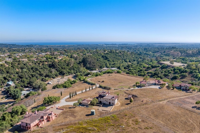 bird's eye view featuring a view of trees