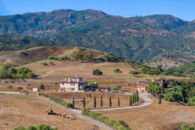 view of mountain feature with a rural view