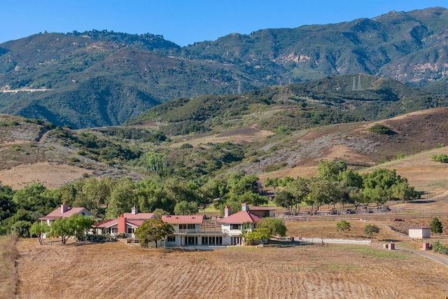 view of mountain feature featuring a rural view