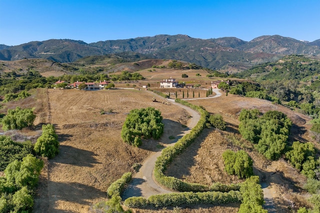 aerial view featuring a rural view and a mountain view