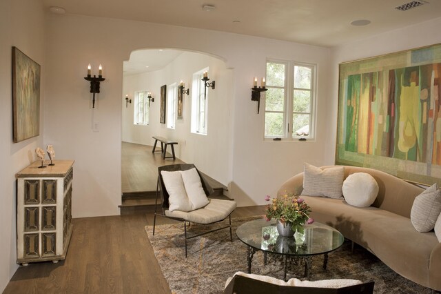 sitting room featuring wood-type flooring