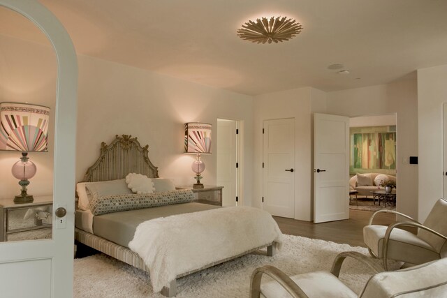 bedroom featuring wood-type flooring