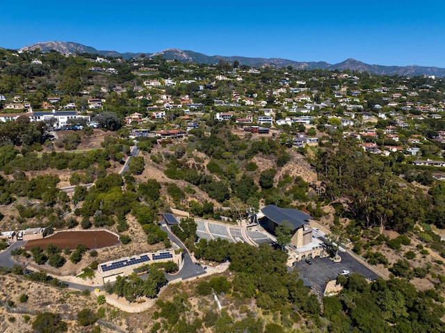 drone / aerial view featuring a mountain view