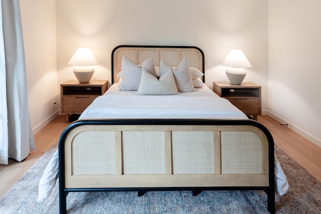 bedroom featuring light hardwood / wood-style floors