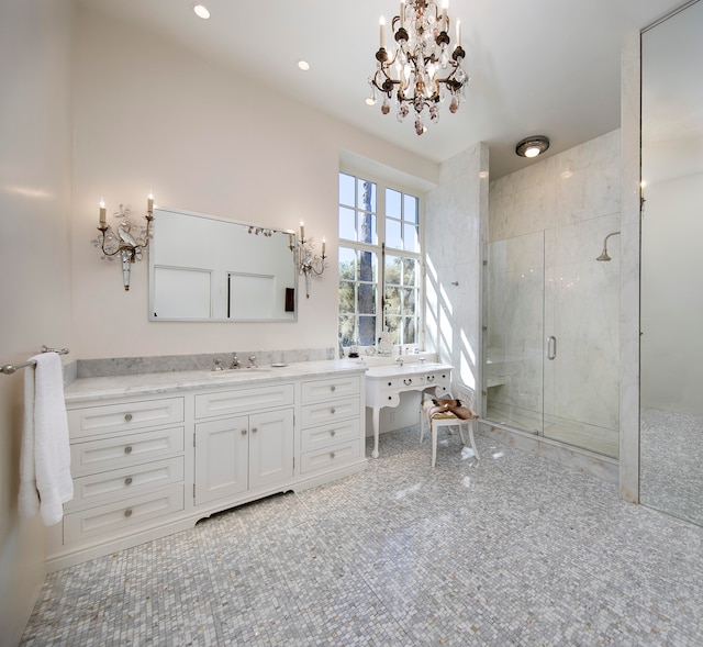 bathroom with tile patterned floors, an enclosed shower, and vanity