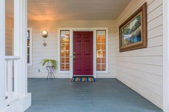 property entrance featuring a porch