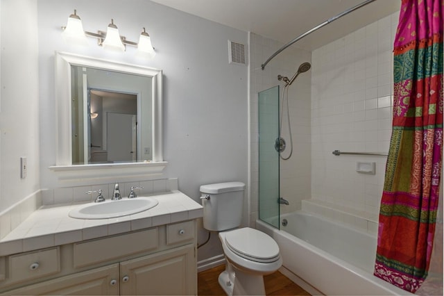 full bathroom with vanity, toilet, wood-type flooring, and shower / bath combination with curtain