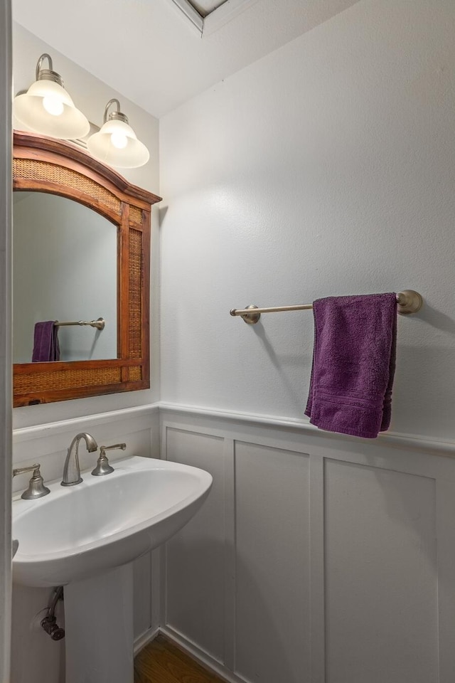 bathroom featuring hardwood / wood-style floors and sink