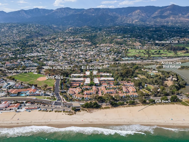 birds eye view of property featuring a beach view and a water and mountain view