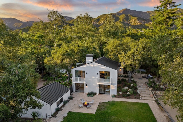 exterior space featuring a mountain view