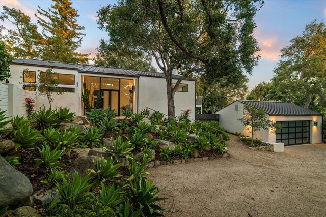 exterior space with a garage