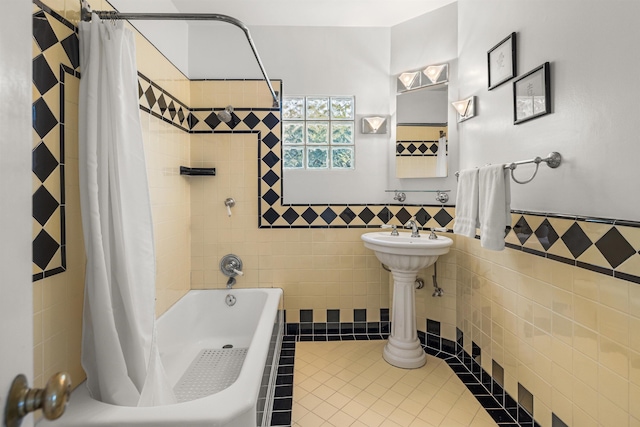 3050 Serena Rd, Santa Barbara, CA 93105 - bathroom with tile walls, tile patterned flooring, and shower / tub combo with curtain