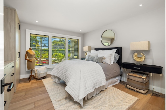 bedroom featuring light hardwood / wood-style floors