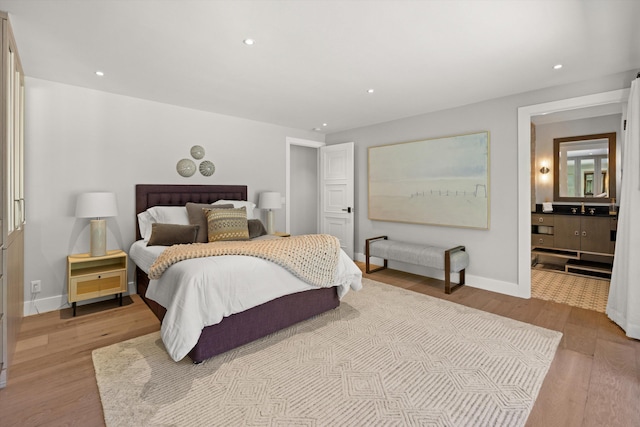 bedroom featuring light hardwood / wood-style flooring