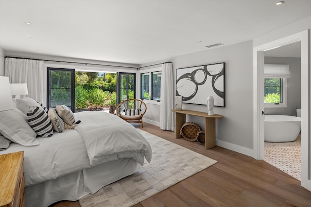 bedroom featuring wood-type flooring