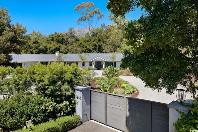 view of front of home with a mountain view