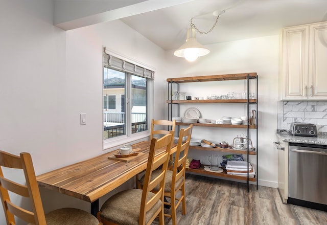 dining room with dark wood-type flooring