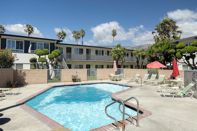 view of pool with a patio