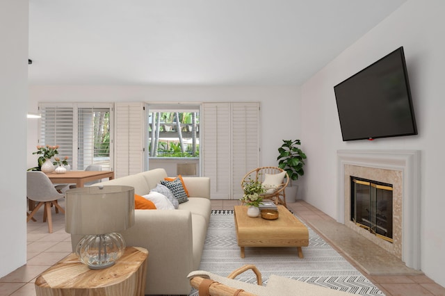 tiled living room featuring a premium fireplace