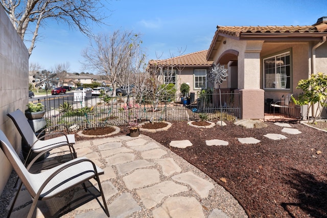 view of patio featuring fence