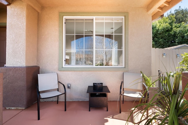 view of patio / terrace featuring fence