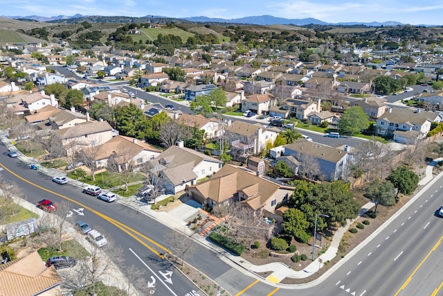 birds eye view of property featuring a residential view and a mountain view