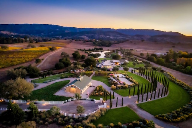 aerial view at dusk with a mountain view