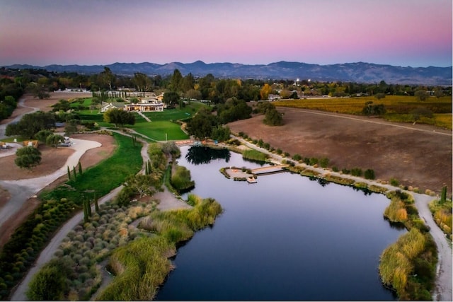 view of home's community with a water and mountain view