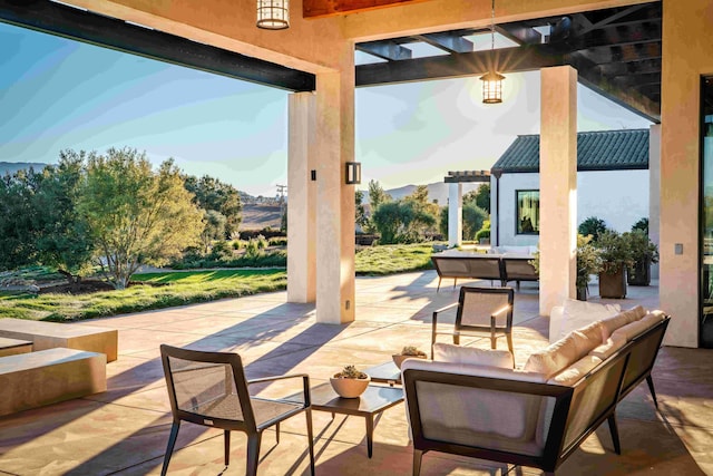 view of patio with a pergola, outdoor lounge area, and a mountain view