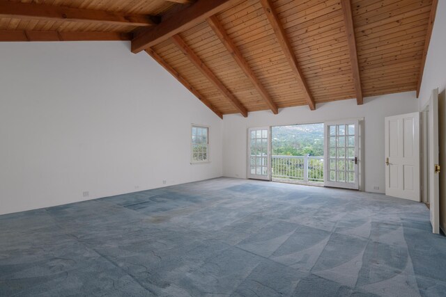 interior space featuring wood ceiling, beam ceiling, high vaulted ceiling, and carpet flooring