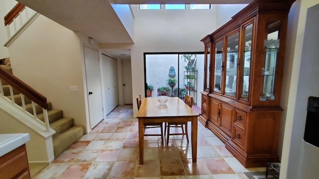 dining room with stairs