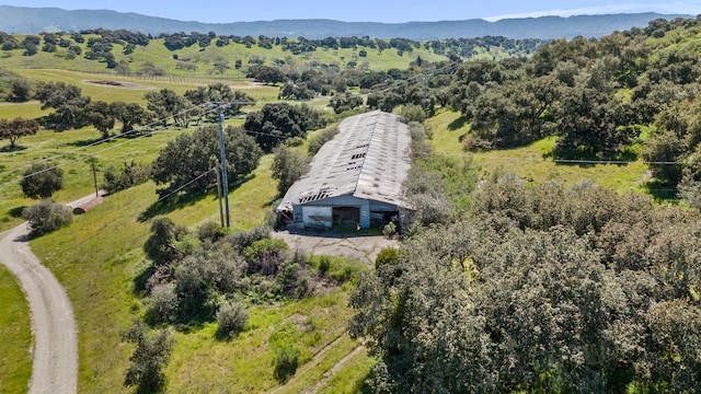 birds eye view of property featuring a rural view and a mountain view