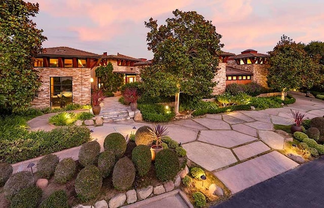 view of front of property featuring a patio