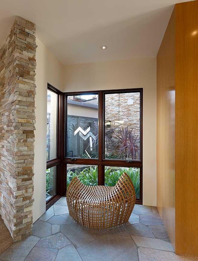 hallway featuring a wealth of natural light