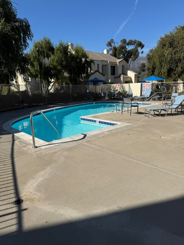 view of pool with a patio