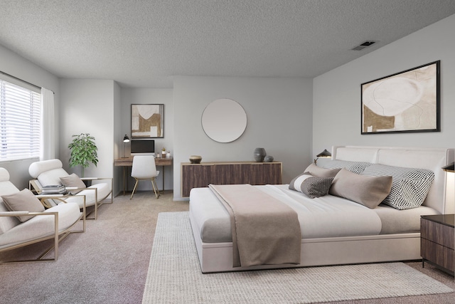 bedroom with light colored carpet and a textured ceiling