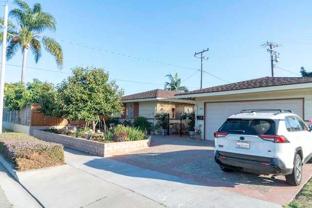 ranch-style home with a garage