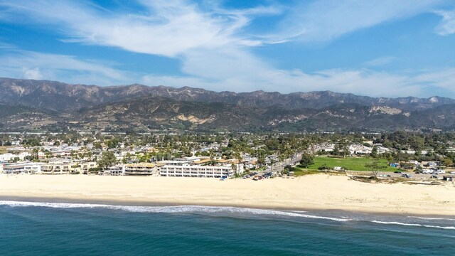 mountain view with a water view and a view of the beach